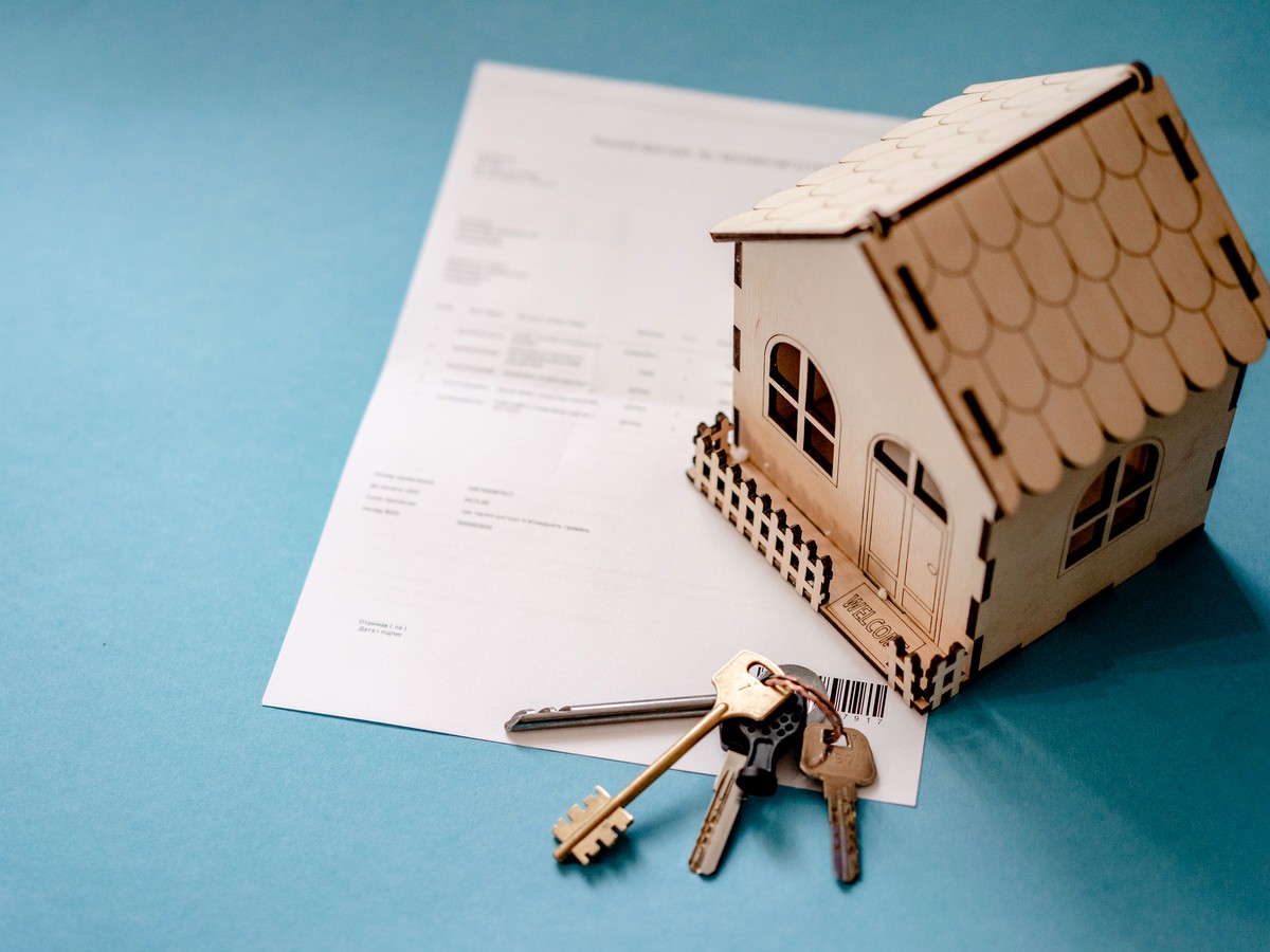 Rental property paperwork, house and keys